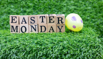 Easter,Monday,Wooden,Block,On,Green,Grass