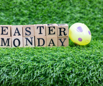 Easter,Monday,Wooden,Block,On,Green,Grass